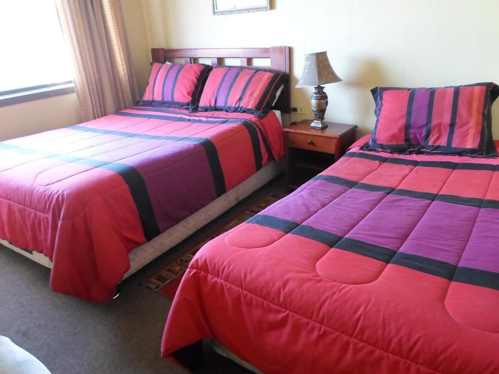 Hotel Don Teo Puerto Montt Szoba fotó